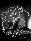 Multiple Exposure of Artist Pablo Picasso Using Flashlight to Make Light Drawing of a Figure