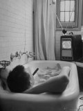 Writer Russell Finch Taking Portable Television Set to Bathroom During His Bath