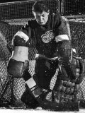 Terry Sawchuck  Star Goalie for the Detroit Red Wings  Warding Off Shot on Goal  at Ice Arena