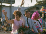 California Republican Gubernatorial Candidate Ronald Reagan and Wife Nancy Waving