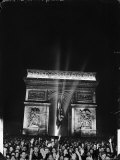 Crowd of Parisians under the Arc de Triomphe Celebrating the Liberation of the City