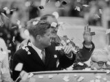 Dem Pres Candidate John Kennedy Showered with Confetti During Campaign Motorcade
