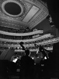 Leopold Stokowski Conducting the New York Philharmonic Orchestra in Performance at Carnegie Hall
