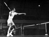 Tennis Player Althea Gibson  Preparing to Hit the Ball While Playing Tennis