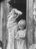 Pregnant Sharecropper's Wife Standing in Doorway of Wooden Shack with Daughter  the Depression