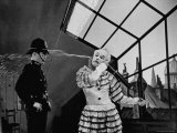 Charlie Chaplin Squirting Water Into Face of Policeman  Scene from Limelight