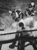Ice Hockey Players Bill Mosienko and Max Bentley Making a Play Against the Goalie