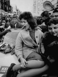 Dem Pres Candidate John Kennedy in Car Adorned with One of His Screaming Female Fans