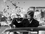 Dem Pres Candidate John Kennedy Showered with Confetti During Campaign Motorcade