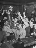Celebrating After Hunt  Winner Herb Hartley holding cash prize  Teammates Congratulate Each Other
