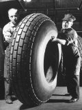 Workers with Truck Tires at Us Rubber Plant