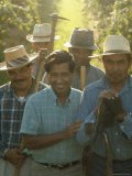 Labor Activist Cesar Chavez Talking in Field with Grape Pickers of United Farm Workers Union