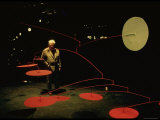 Alexander Calder Walking Past Exhibit of His Mobiles at the Guggenheim Museum