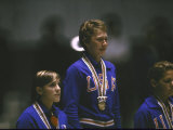 Cathy Ferguson on Victory Stand After Winning Gold Medal in 100 Meter Backstroke at Summer Olympics