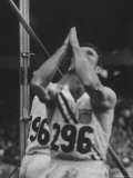 Pole Vaulter Bob Richards Praying Before Competing at the Olympics
