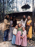 Family of Mystic Arts Commune Members in Front of Home They've Lived in for over One Year