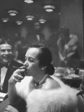 Woman Tries Lady's Cigar in Club After Release of Surgeon General's Report on Smoking Hazards