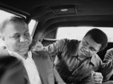 Boxer Muhammad Ali Clowning Around with His Trainer Bundini Brown