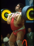 Male Lifting Heavy Weights in Competition at the Olympics