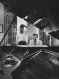 Authors of "My Fair Lady"  Allan Jay Lerner and Frederick Loewe  at Piano Working on Music