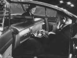 Interior of New Cadillac Equipped with Writing Desk and Typewriter on Display at Automobile Show