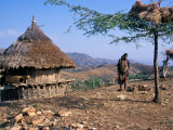 Mother and Child Walk Through a Konso Village  Omo River Region  Ethiopia