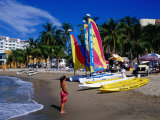 Woman and Yachts on Beach  Westin Regina Resort  Puerto Vallarta  Mexico