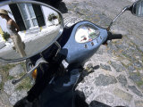 Reflection of Young Woman in Mirror of Vespa Bike  Italy