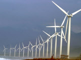 Villagers are Dwarfed by Giant Windmills Built by the Danish Development Agency