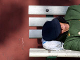 An Elderly Man Sleeps on a Bench Near Beijing's Tiananmen Square