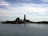 Boston Light is Seen on Little Brewster Island in Boston Harbor