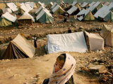 A Kashmiri Boy Left Homeless by October's Earthquake Looks Over a Refugee Camp