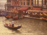 Gondoliers on the Grand Canal  Venice  Italy