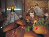 Altar of Food  Candles  Baby Jesus Statues and the Virgins of Soledad and Guadalupe  Oaxaca  Mexico