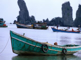 Fishing Boats in Front of the "Father and Son" Rock Formations at Duong Beach Near Ha Tien  Vietnam