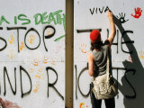 Protester Writing Anti-Uranium Mining Graffiti  Melbourne  Australia
