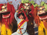 Girl Playing Lion Dance for Chinese New Year  Beijing  China
