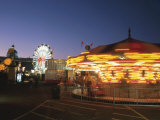 Riding a Spinning Carousel at Night