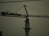 Men Atop a Construction Crane in Beijing