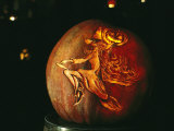Jack-O-Lantern with an Ornate Carved Decoration of a Witch