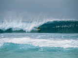 Surfer in the Crest of a Wave in the Bonsai Pipeline in Oahu