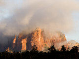 Sunlight Burning Off Morning Fog Surrounding the Red Rocks of Sedona