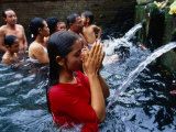People Praying at Holy Water Ceremony  Spring Water Temple  Tampaksiring  Ubud  Indonesia