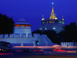 Illuminated Golden Mount at Wat Saket and Democracy Monument Bangkok  Thailand