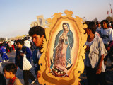 Pilgrim Carrying Icon of Virgin Mary at the Basilica De Guadalupe  Mexico City  Mexico