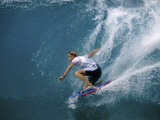 Side Profile of a Man Surfing in the Sea