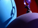 Colorful Purple and Blue Balloons Reflect Shadows in the Light