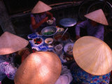 Women in Traditional Conical Hats Sitting Down to Meal at Market  Hoi An  Vietnam
