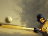 Baseball Player Swinging a Bat