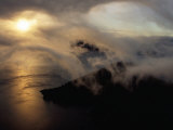 Clouds Sweeping Down into the Caldera at Sunrise  Crater Lake National Park  USA